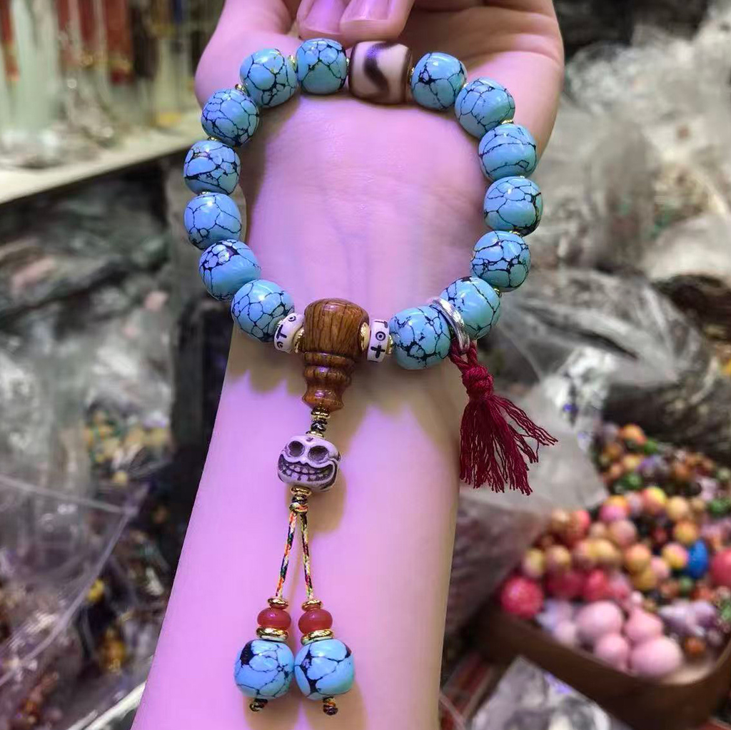 Vintage Tibetan Turquoise-Look Barrel Bead Bracelet | Dzi Agate & Skull Charm Tassel Unisex Ethnic Worry Bead Jewelry