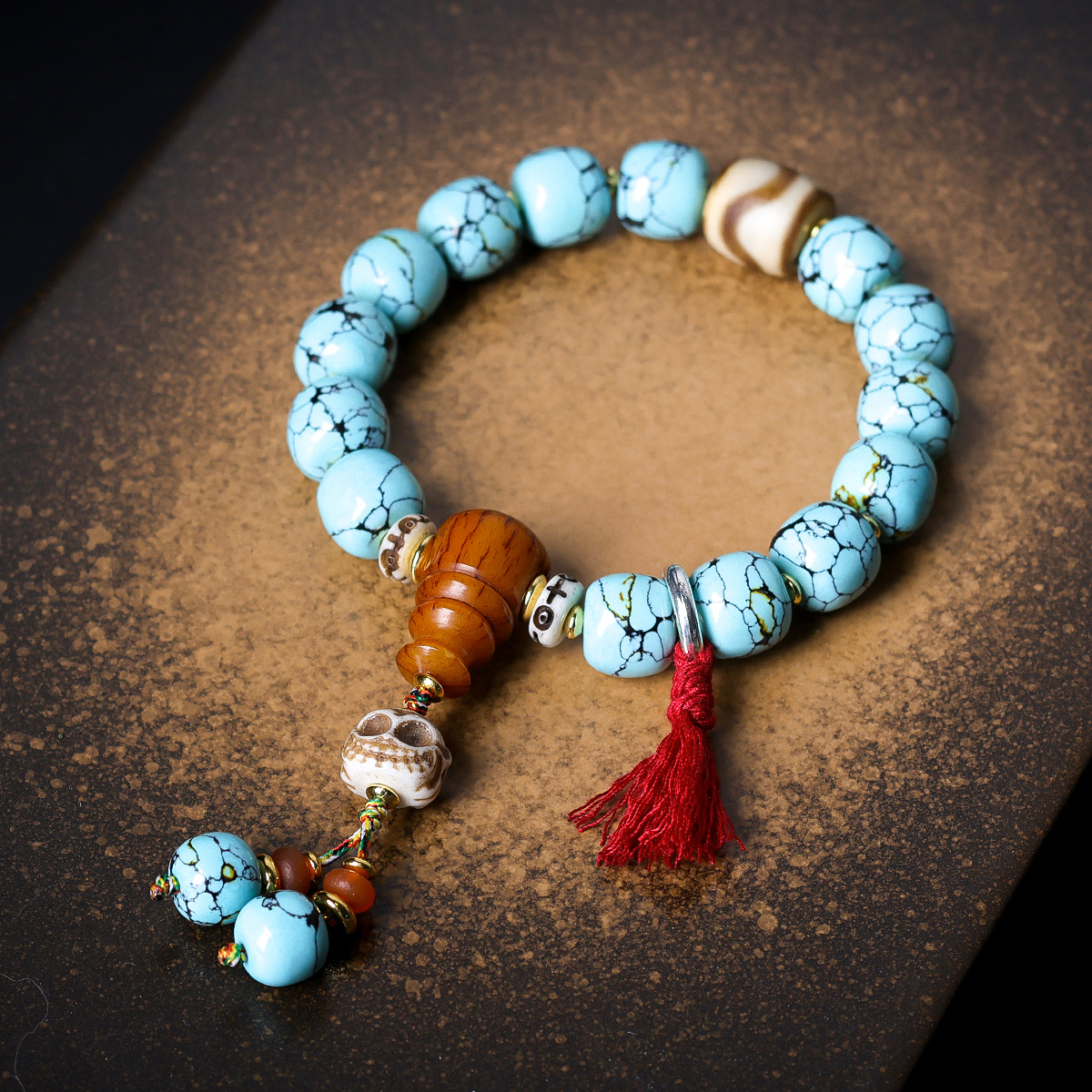 Vintage Tibetan Turquoise-Look Barrel Bead Bracelet | Dzi Agate & Skull Charm Tassel Unisex Ethnic Worry Bead Jewelry
