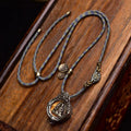 Brass Buddha charm link on braided rope necklace