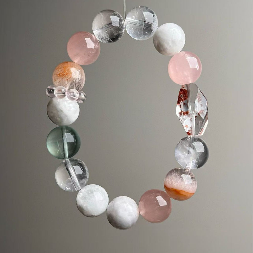 Pastel multi-gemstone bracelet featuring rose quartz, snow phantom and clear quartz beads