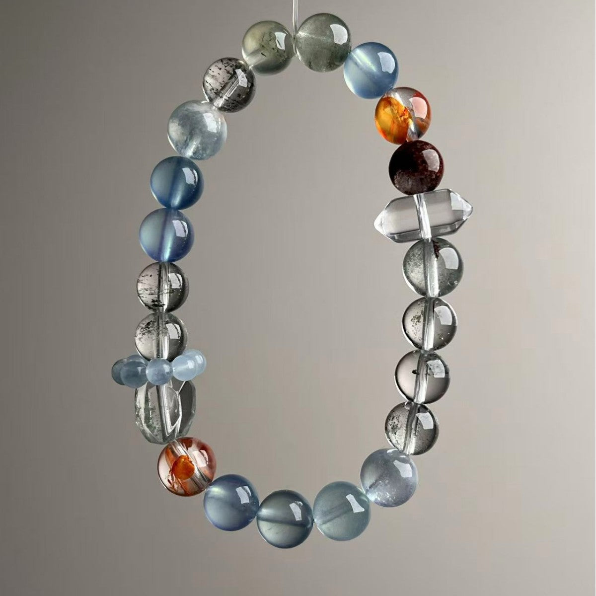 Brazilian mixed crystal bracelet with clear quartz point and amber accent beads