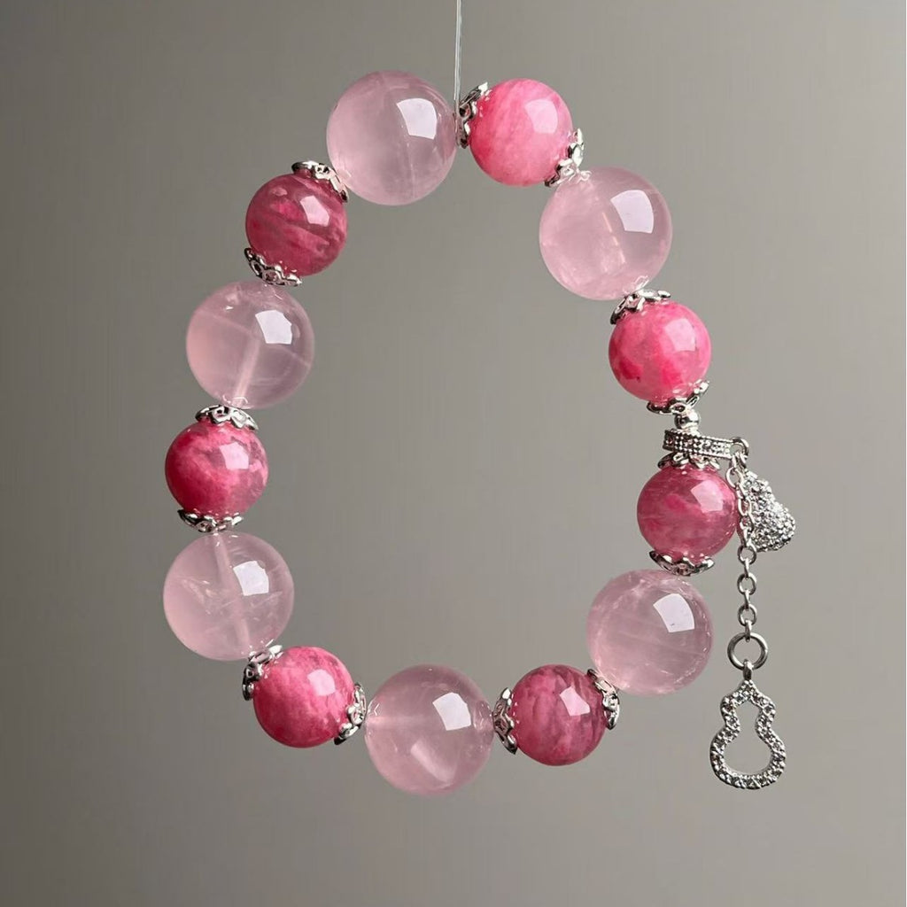 Rose quartz love crystal bracelet with soft pink beads and silver spacer caps