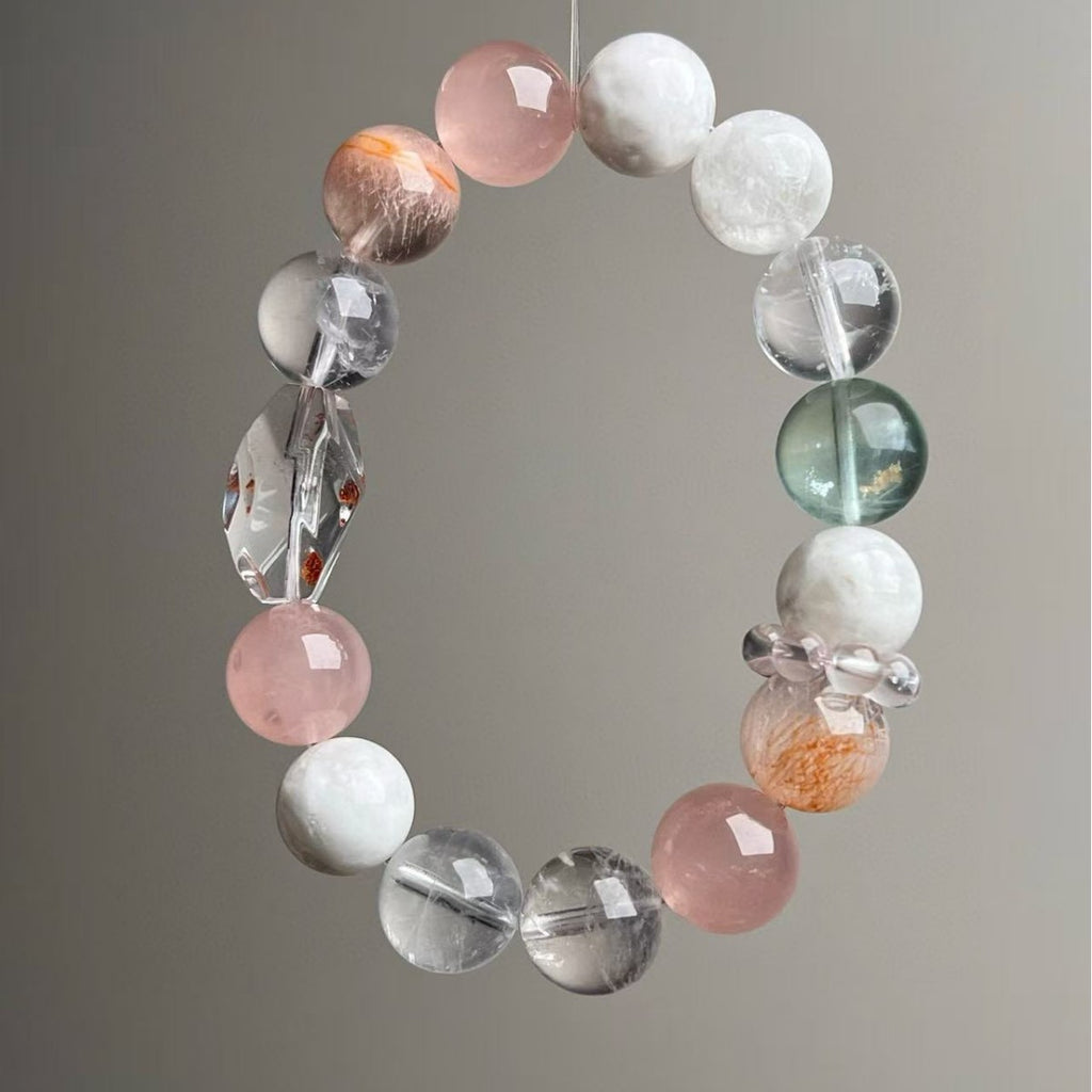 Handmade crystal bracelet with green fluorite, red phantom and rose quartz 12mm beads