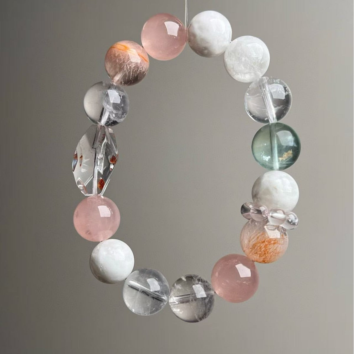Handmade crystal bracelet with green fluorite, red phantom and rose quartz 12mm beads