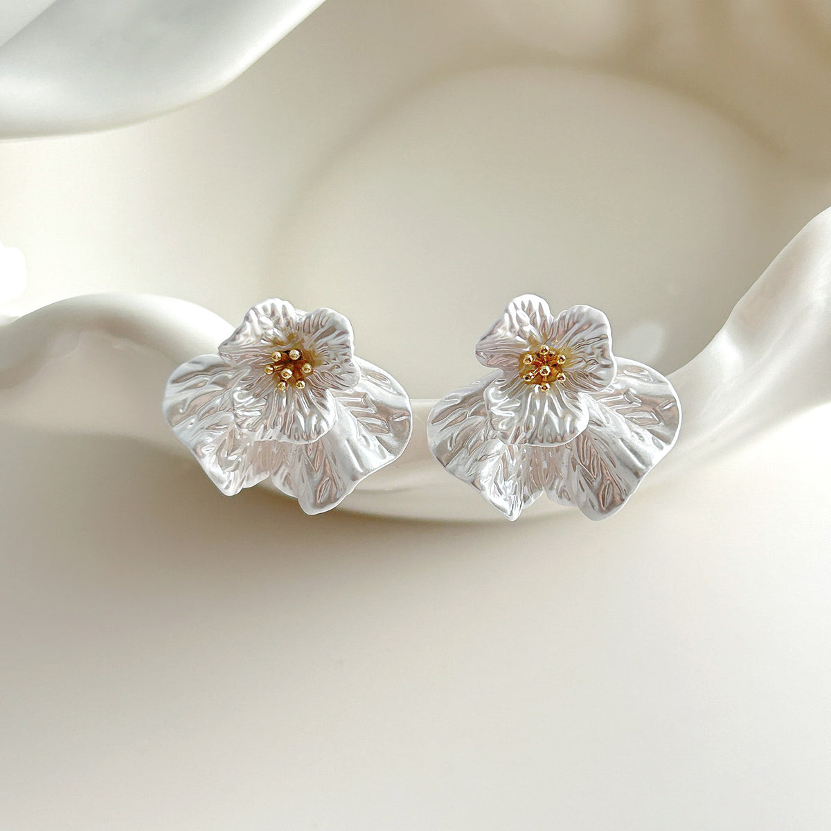 French Style 3D Flower Stud Earrings side view on model