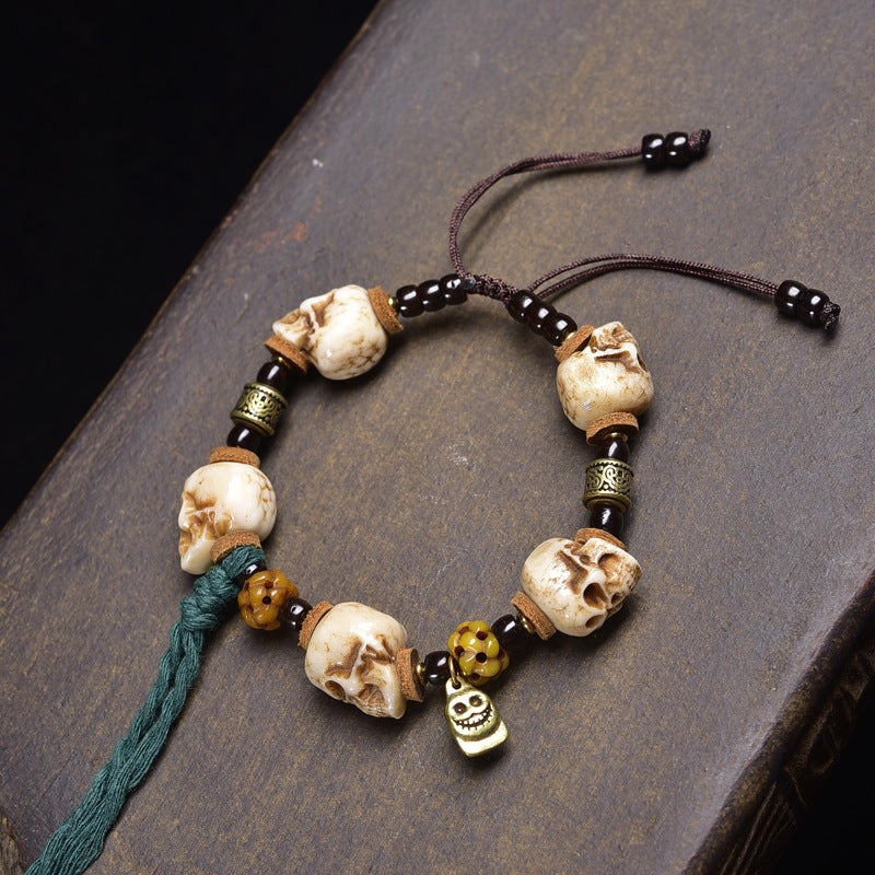 Multi-skull tassel style Citipati bracelet