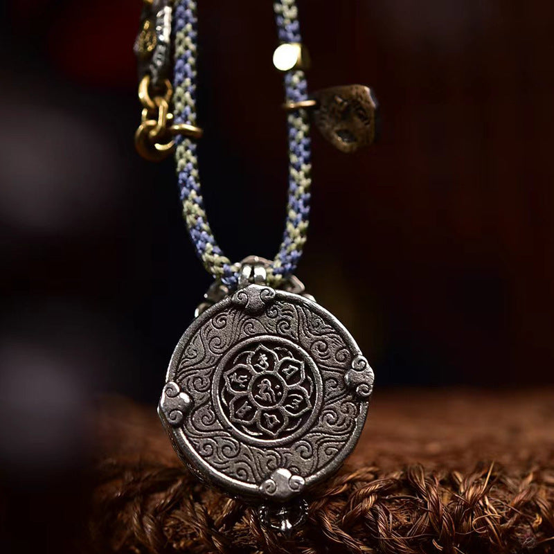 Yellow Jambhala gau box pendant front view