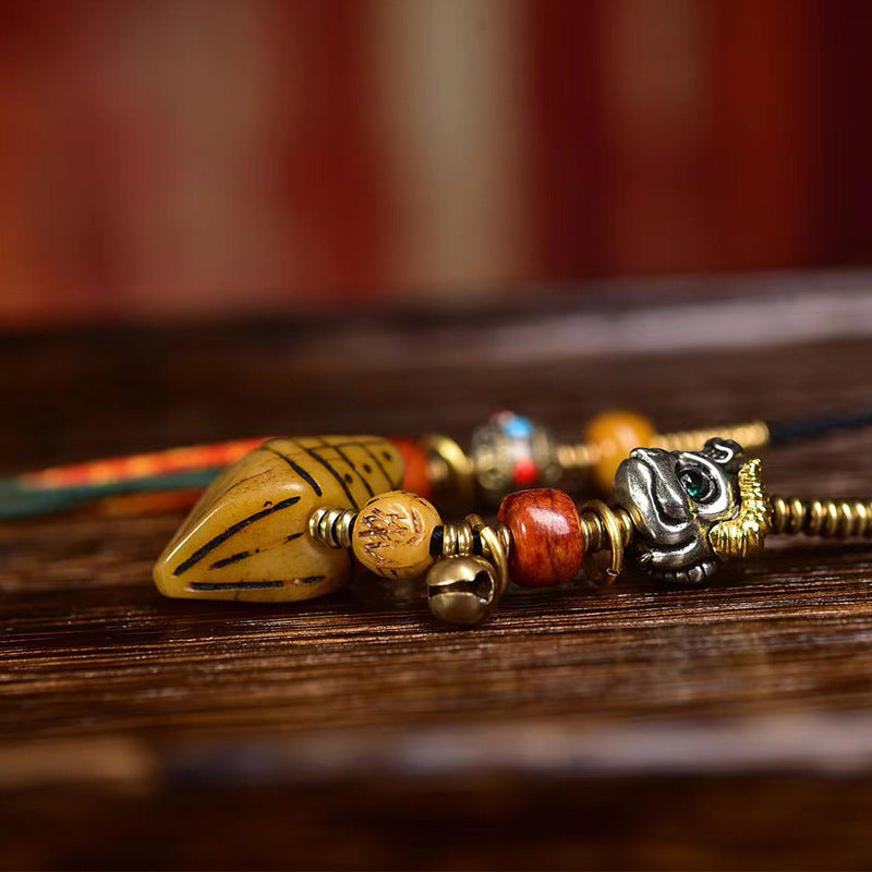 Ethnic statement necklace displayed on bust