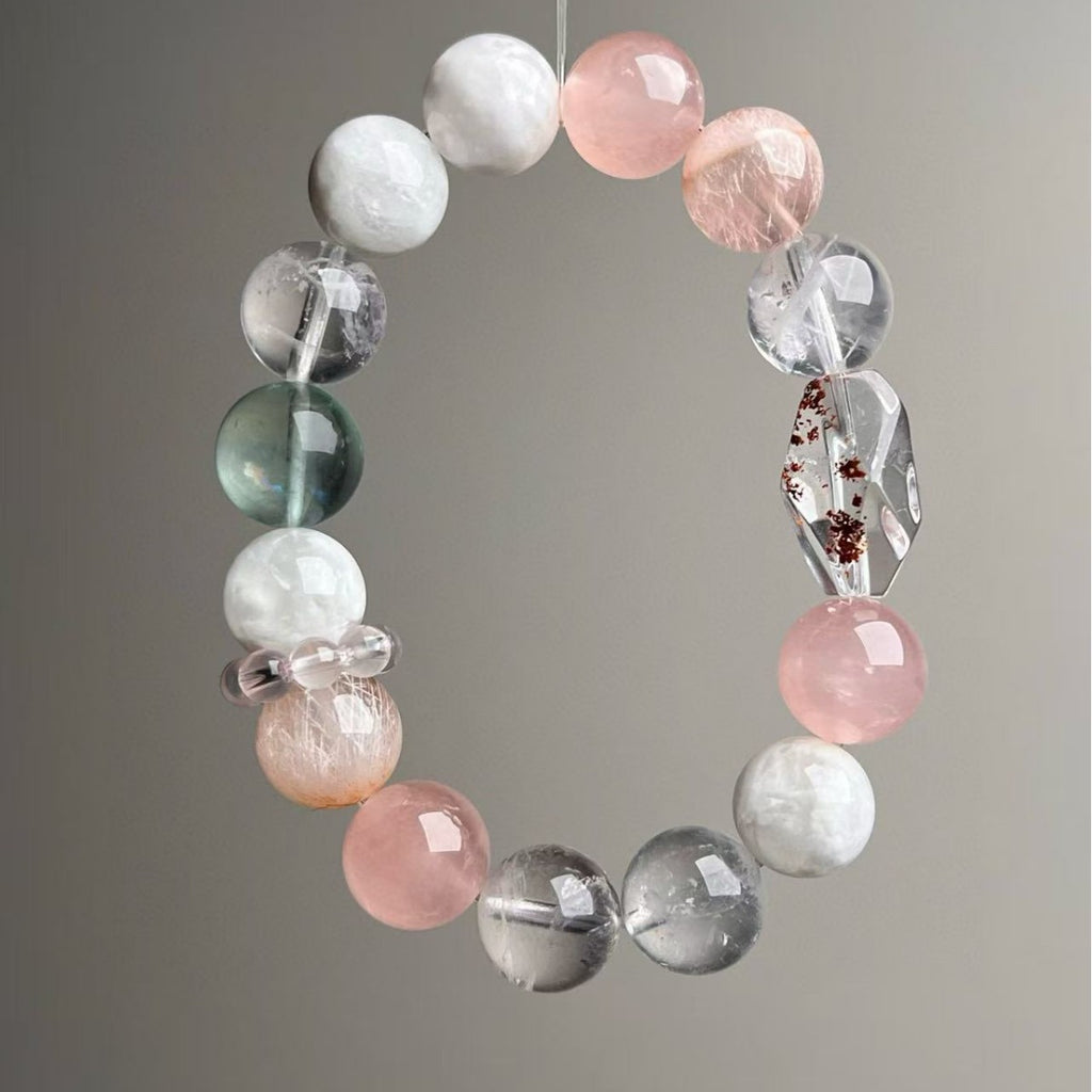 Natural multi-crystal beaded bracelet in soft pink, green and clear tones