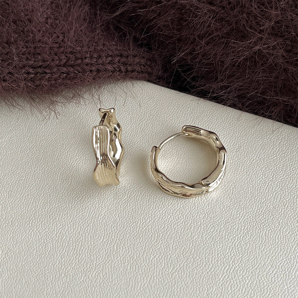 Four styles of coffee gold huggie hoop earrings