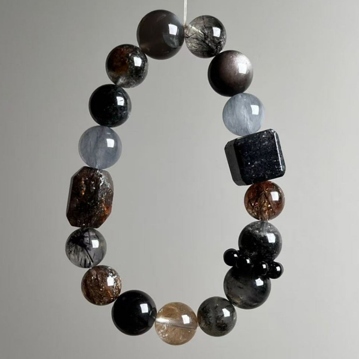 Handmade Super Seven beaded bracelet in black, grey and brown natural crystal tones