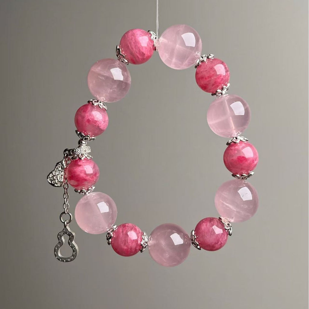 Close-up of natural rose quartz 11-14mm beads in romantic pink tones