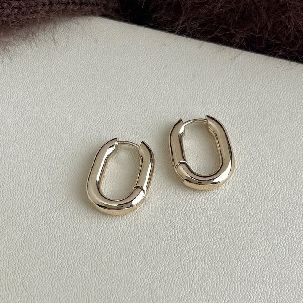 Smooth oval geometric gold hoop earrings