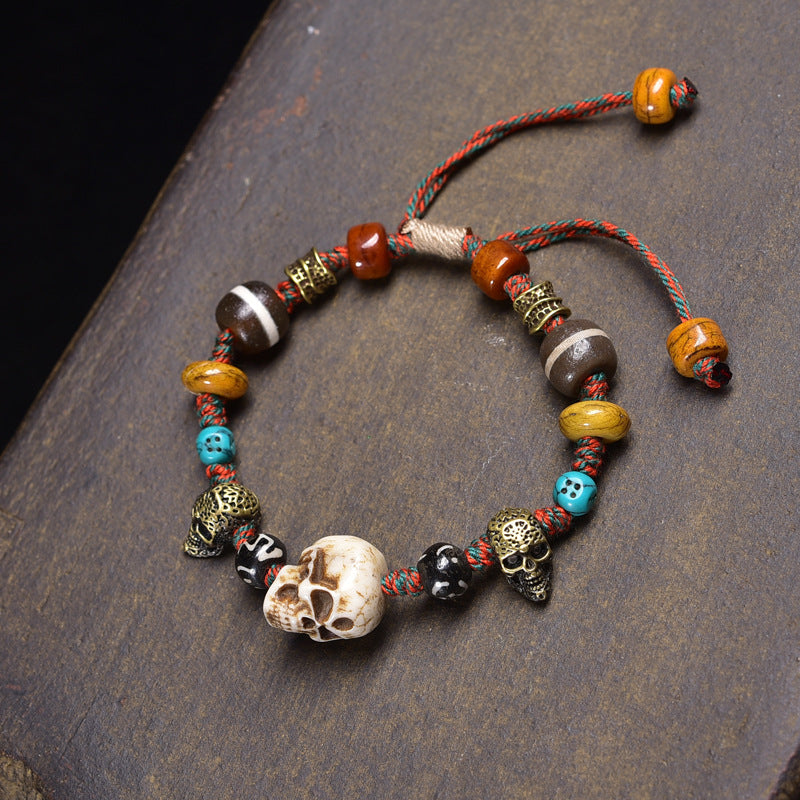 Caramel bone barrel Citipati bracelet with teal cord